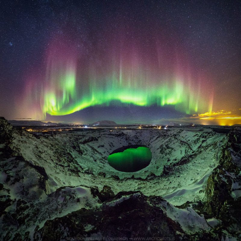 Aurora in Crater Lake by Sigurdur William