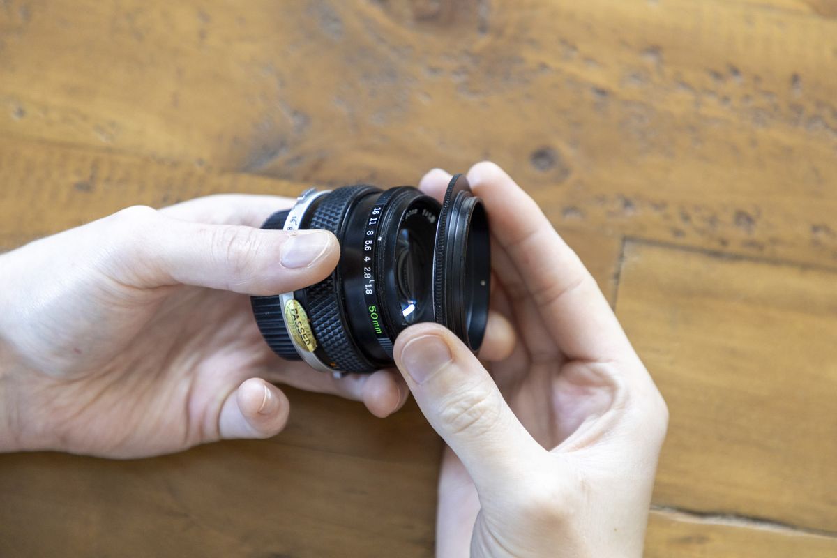 لنز قدیمی المپوس و حلقه معکوس